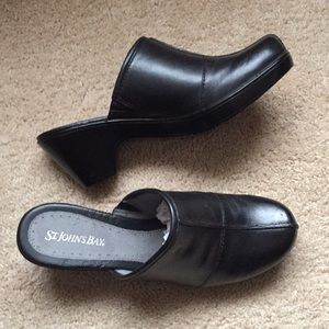 Black leather clogs
